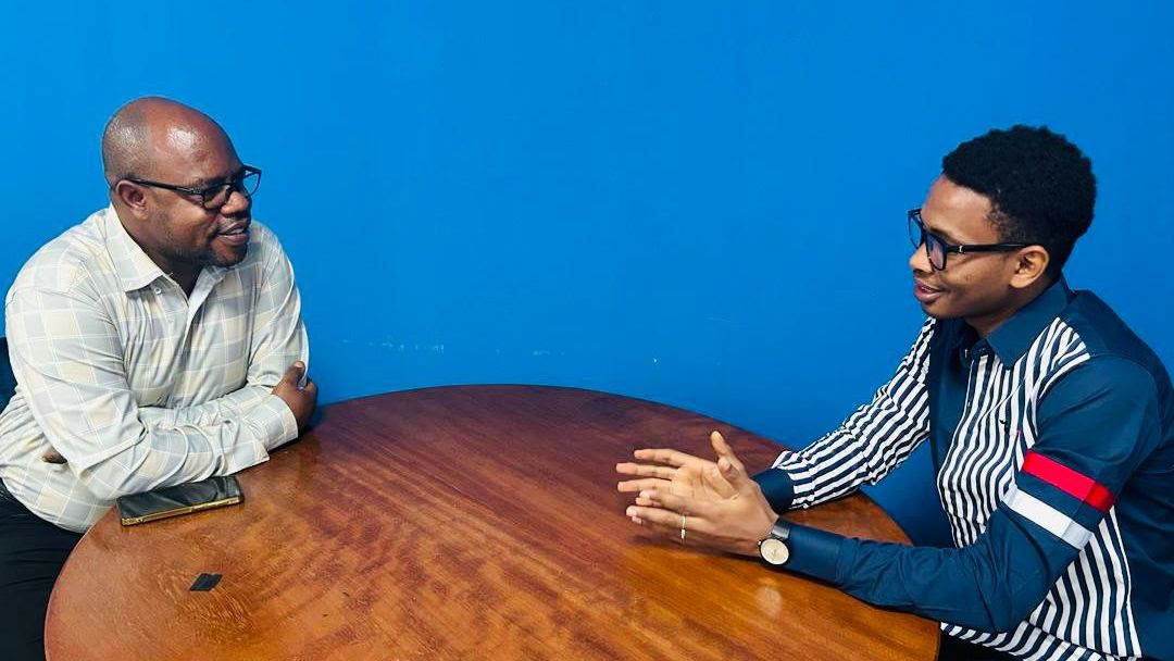 Mamadou Alpha Diallo (at right) meets in Kinshasa with 2022 ELAW Fellow Jimmy Munguriek.